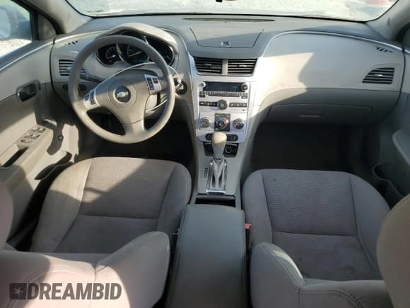 ✅ 2012 Chevrolet Malibu 1LS • VIN: 1G1ZB5E01CF168067 • Lot: 71671704. Listed on Copart with 169,599 mi. Free auction sales archive from the USA and detailed vehicle history report at DreamBid. Image 8.