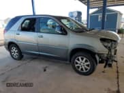 ✅ 2002 Buick Rendezvous CX • VIN: 3G5DA03E52S607407 • Лот: 70388145. Опубликован ранее на Copart с пробегом 135 766 миль. Бесплатный доступ к архиву аукционных продаж из США и подробный отчёт об истории автомобиля на DreamBid. Изображение 4.