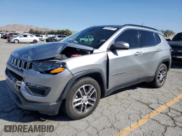 ✅ 2019 Jeep Compass Latitude • VIN: 3C4NJCBB4KT706266 • Lot: 80528075. Listed on Copart with 142,410 mi. Free auction sales archive from the USA and detailed vehicle history report at DreamBid. Image 1.