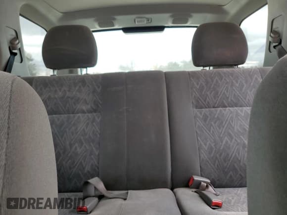 ✅ 2004 Isuzu Rodeo S • VIN: 4S2CK58Y744305349 • Lot: 82386444. Listed on Copart with 162,752 mi. Free auction sales archive from the USA and detailed vehicle history report at DreamBid. Image 9.