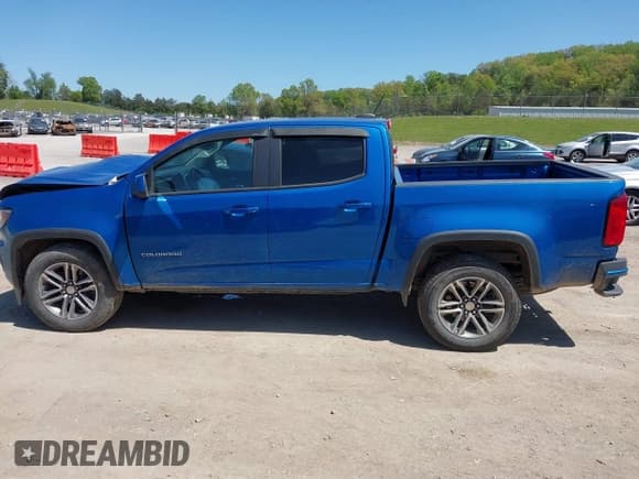 ✅ 2022 Chevrolet Colorado 2WD LT • VIN: 1GCGSCENXN1123398 • Lot: 42016493. Listed on IAAI with 58,326 mi. Free auction sales archive from the USA and detailed vehicle history report at DreamBid. Image 14.