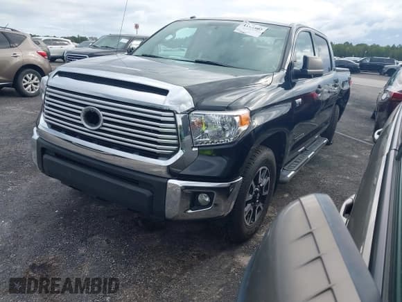 ✅ 2014 Toyota Tundra SR5 • VIN: 5TFEY5F10EX147641 • Lot: 43361602. Listed on IAAI with 199,605 mi. Free auction sales archive from the USA and detailed vehicle history report at DreamBid. Image 2.