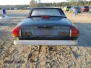 ✅ 1988 Jaguar XJS • VIN: SAJNA3847JC142262 • Лот: 89409685. Опубликован ранее на Copart с пробегом 69 223 миль. Бесплатный доступ к архиву аукционных продаж из США и подробный отчёт об истории автомобиля на DreamBid. Изображение 6.