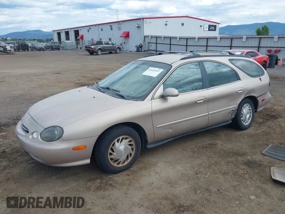 ✅ 1998 Ford Taurus • VIN: 1FAFP57U8WG275844 • Lot: 42426107. Wystawiony na IAAI z przebiegiem 318 654 mil. Bezpłatny archiwum sprzedaży aukcyjnych z USA i szczegółowy raport historii pojazdu na DreamBid. Zdjęcie 2.