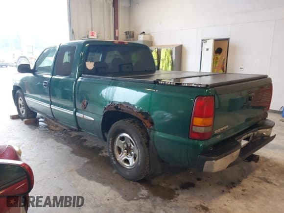 ✅ 1999 GMC Sierra 1500 SLE • VIN: 2GTEC19T0X1527504 • Lot: 43012004. Listed on IAAI with Not provided. Free auction sales archive from the USA and detailed vehicle history report at DreamBid. Image 3.
