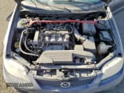 ✅ 2002 Mazda Protege • VIN: JM1BJ245921501313 • Lot: 74797214. Wystawiony na Copart z przebiegiem 241 536 mil. Bezpłatny archiwum sprzedaży aukcyjnych z USA i szczegółowy raport historii pojazdu na DreamBid. Zdjęcie 13.