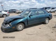 ✅ 1996 Mazda 626 DX • VIN: 1YVGE22C8T5526137 • Lot: 60801585. Listed on Copart with 94,415 mi. Free auction sales archive from the USA and detailed vehicle history report at DreamBid. Image 1.