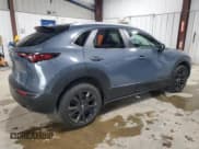 ✅ 2022 Mazda CX-30 S Carbon Edition • VIN: 3MVDMBCL5NM442752 • Лот: 89632795. Опубликован ранее на Copart с пробегом 24 355 миль. Бесплатный доступ к архиву аукционных продаж из США и подробный отчёт об истории автомобиля на DreamBid. Изображение 3.
