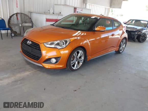 ✅ 2013 Hyundai Veloster Turbo • VIN: KMHTC6AE2DU178083 • Lot: 43039378. Wystawiony na IAAI z przebiegiem 126 260 mil. Bezpłatny archiwum sprzedaży aukcyjnych z USA i szczegółowy raport historii pojazdu na DreamBid. Zdjęcie 2.