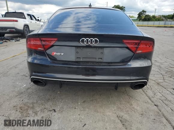 ✅ 2014 Audi RS 7 Prestige • VIN: WUAW2AFC5EN904659 • Lot: 67438035. Wystawiony na Copart z przebiegiem 93 569 mil. Bezpłatny archiwum sprzedaży aukcyjnych z USA i szczegółowy raport historii pojazdu na DreamBid. Zdjęcie 6.