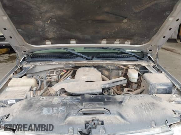 2005 Chevrolet Suburban LS z VIN 1GNFK16Z85J145229, wystawiony jako IAAI lot #42706478 z przebiegiem 198 500 mil mil oraz . Historia ofert i sprzedaży dostępna na DreamBid. Obrazek 10.