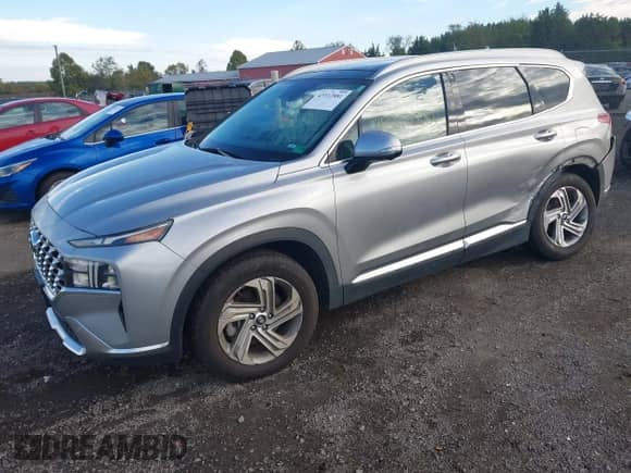 2023 Hyundai Santa Fe SEL with VIN 5NMS34AJXPH524877, listed as a IAAI auction lot 43312881 with 63,983 mi miles and . Bid and sale history available at DreamBid. Image 2.