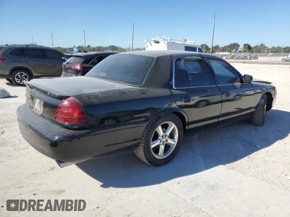✅ 2003 Mercury Marauder • VIN: 2MEHM75VX3X616832 • Lot: 41696555. Wystawiony na Copart z przebiegiem 132 095 mil. Bezpłatny archiwum sprzedaży aukcyjnych z USA i szczegółowy raport historii pojazdu na DreamBid. Zdjęcie 3.
