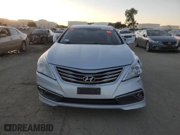 2016 Hyundai Azera z VIN KMHFG4JG4GA563397, wystawiony jako Copart lot #87879325 z przebiegiem 58 528 mil mil oraz Szkoda całkowita • Salvage title. Historia ofert i sprzedaży dostępna na DreamBid. Obrazek 5.