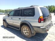 ✅ 2000 Mitsubishi Montero Sport LS • VIN: JA4LS31H3YP054032 • Lot: 57260655. Listed on Copart with Not provided. Free auction sales archive from the USA and detailed vehicle history report at DreamBid. Image 2.