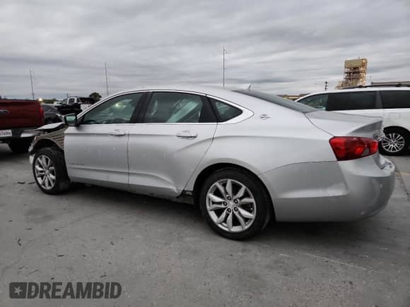 2017 Chevrolet Impala LT with VIN 2G1105SAXH9153616, listed as a Copart auction lot 87471965 with 217,950 mi miles and Salvage title. Bid and sale history available at DreamBid. Image 2.