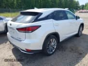 ✅ 2022 Lexus RX 450h • VIN: 2T2JGMDA7NC085504 • Lot: 42201846. Listed on IAAI with 47,659 mi. Free auction sales archive from the USA and detailed vehicle history report at DreamBid. Image 4.