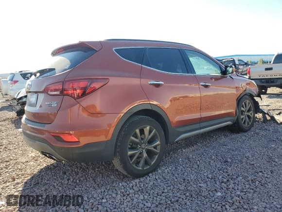 ✅ 2017 Hyundai Santa Fe Ultimate • VIN: 5XYZWDLA8HG501628 • Лот: 69118624. Опубликован ранее на Copart с пробегом 91 978 миль. Бесплатный доступ к архиву аукционных продаж из США и подробный отчёт об истории автомобиля на DreamBid. Изображение 3.