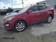 2016 Hyundai Santa Fe z VIN 5XYZWDLA3GG313145, wystawiony jako Copart lot #85717215 z przebiegiem Nie podano mil oraz Szkoda całkowita • Salvage title. Historia ofert i sprzedaży dostępna na DreamBid. Obrazek 1.