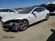 ✅ 2014 Tesla Model S 60 • VIN: 5YJSA1H11EFP57345 • Lot: 70719985. Listed on Copart with 149,484 mi. Free auction sales archive from the USA and detailed vehicle history report at DreamBid. Image 1.