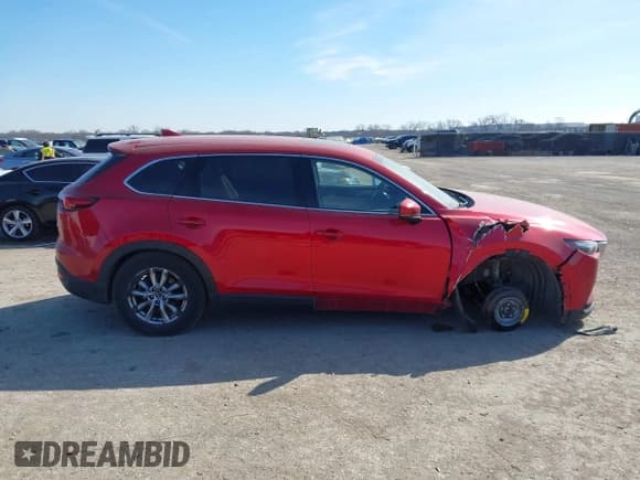 ✅ 2016 Mazda CX-9 Touring • VIN: JM3TCBCY7G0100311 • Lot: 41588448. Listed on IAAI with 115,364 mi. Free auction sales archive from the USA and detailed vehicle history report at DreamBid. Image 13.