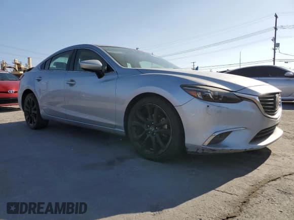 ✅ 2016 Mazda 6 i Grand Touring • VIN: JM1GJ1W55G1437923 • Лот: 84768675. Опубликован ранее на Copart с пробегом 181 509 миль. Бесплатный доступ к архиву аукционных продаж из США и подробный отчёт об истории автомобиля на DreamBid. Изображение 4.