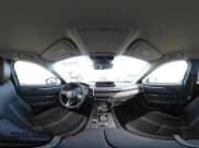 ✅ 2025 Mazda CX-50 S Preferred • VIN: 7MMVABBM1SN392085 • Lot: 43723950. Listed on IAAI with 1,452 mi. Free auction sales archive from the USA and detailed vehicle history report at DreamBid. Image 19.