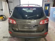 ✅ 2012 Hyundai Santa Fe SE • VIN: 5XYZH4AG6CG135162 • Lot: 79197764. Listed on Copart with 87,661 mi. Free auction sales archive from the USA and detailed vehicle history report at DreamBid. Image 6.