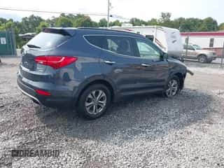 2014 Hyundai Santa Fe with VIN 5XYZUDLB5EG153555, listed as a IAAI auction lot 43145430 with 140,750 mi miles and . Bid and sale history available at DreamBid. Image 4.