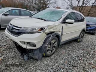 ✅ 2015 Honda CR-V Touring • VIN: 5J6RM4H91FL124933 • Лот: 94083665. Опубликован ранее на Copart с пробегом 81 639 миль. Бесплатный доступ к архиву аукционных продаж из США и подробный отчёт об истории автомобиля на DreamBid. Изображение 1.