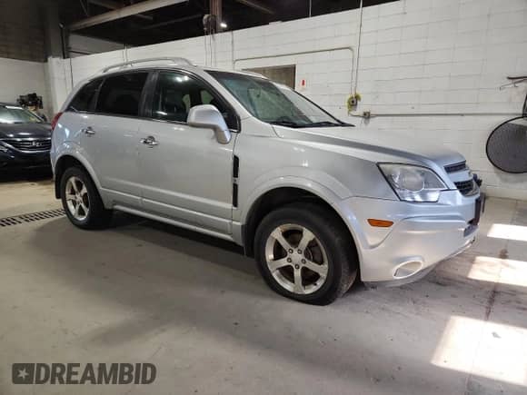 2012 Chevrolet Captiva Sport LTZ with VIN 3GNFL4E59CS592869, listed as a Copart auction lot 90407995 with 174,518 mi miles and Clean title. Bid and sale history available at DreamBid. Image 4.