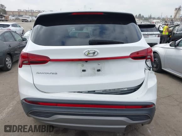 ✅ 2023 Hyundai Santa Fe SE • VIN: 5NMS14AJ5PH562703 • Lot: 43627051. Listed on IAAI with 38,143 mi. Free auction sales archive from the USA and detailed vehicle history report at DreamBid. Image 16.