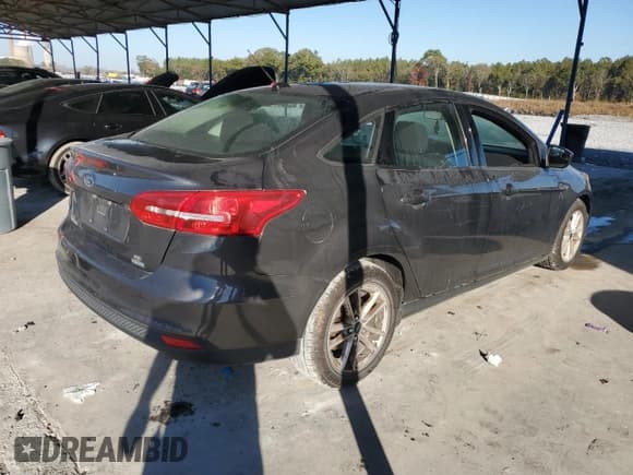 ✅ 2018 Ford Focus SE • VIN: 1FADP3FE4JL276933 • Lot: 90671225. Listed on Copart with 89,503 mi. Free auction sales archive from the USA and detailed vehicle history report at DreamBid. Image 3.