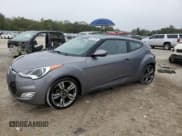 ✅ 2017 Hyundai Veloster • VIN: KMHTC6AD0HU321013 • Lot: 86071034. Wystawiony na Copart z przebiegiem 84 184 mil. Bezpłatny archiwum sprzedaży aukcyjnych z USA i szczegółowy raport historii pojazdu na DreamBid. Zdjęcie 1.