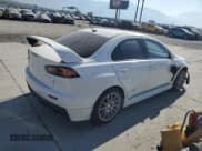 ✅ 2015 Mitsubishi Lancer Evolution GSR • VIN: JA32W8FV4FU024603 • Lot: 74699914. Wystawiony na Copart z przebiegiem 81 311 mil. Bezpłatny archiwum sprzedaży aukcyjnych z USA i szczegółowy raport historii pojazdu na DreamBid. Zdjęcie 3.