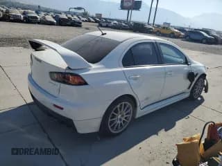 ✅ 2015 Mitsubishi Lancer Evolution GSR • VIN: JA32W8FV4FU024603 • Lot: 74699914. Wystawiony na Copart z przebiegiem 81 311 mil. Bezpłatny archiwum sprzedaży aukcyjnych z USA i szczegółowy raport historii pojazdu na DreamBid. Zdjęcie 3.