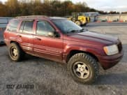 ✅ 1999 Jeep Grand Cherokee Limited • VIN: 1J4GW68N9XC548775 • Lot: 90631235. Wystawiony na Copart z przebiegiem 193 324 mil. Bezpłatny archiwum sprzedaży aukcyjnych z USA i szczegółowy raport historii pojazdu na DreamBid. Zdjęcie 4.