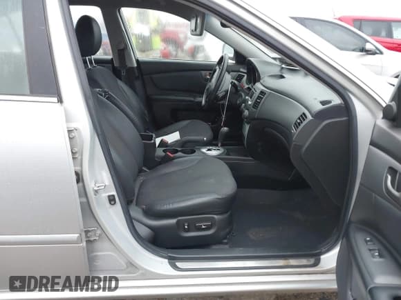 ✅ 2009 Kia Optima SX • VIN: KNAGE224095332691 • Lot: 41537394. Wystawiony na IAAI z przebiegiem 108 314 mil. Bezpłatny archiwum sprzedaży aukcyjnych z USA i szczegółowy raport historii pojazdu na DreamBid. Zdjęcie 5.