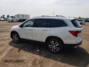 ✅ 2017 Honda Pilot Touring • VIN: 5FNYF6H95HB509635 • Lot: 57074145. Wystawiony na Copart z przebiegiem 101 513 mil. Bezpłatny archiwum sprzedaży aukcyjnych z USA i szczegółowy raport historii pojazdu na DreamBid. Zdjęcie 2.