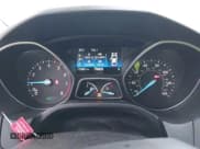 ✅ 2018 Ford Focus Titanium • VIN: 1FADP3N25JL278889 • Лот: 43693208. Опубликован ранее на IAAI с пробегом 79 661 миль. Бесплатный доступ к архиву аукционных продаж из США и подробный отчёт об истории автомобиля на DreamBid. Изображение 7.