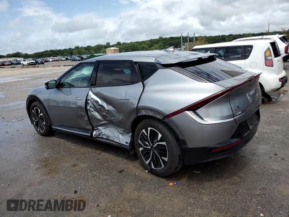 ✅ 2023 Kia EV6 Wind • VIN: KNDC3DLC0P5122467 • Лот: 61112594. Опубликован ранее на Copart с пробегом 9 645 миль. Бесплатный доступ к архиву аукционных продаж из США и подробный отчёт об истории автомобиля на DreamBid. Изображение 2.