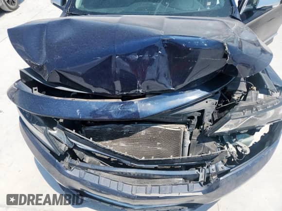 2018 Chevrolet Impala Premier z VIN 2G1125S34J9178450, wystawiony jako Copart lot #69664525 z przebiegiem 102 405 mil mil oraz Szkoda całkowita • Salvage title. Historia ofert i sprzedaży dostępna na DreamBid. Obrazek 11.