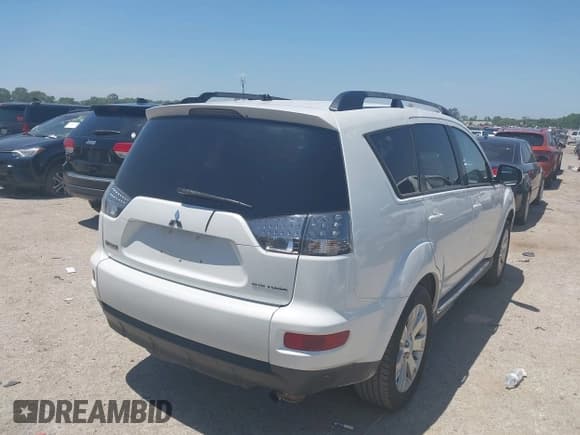 ✅ 2012 Mitsubishi Outlander SE • VIN: JA4AS3AW7CU013452 • Lot: 42523951. Wystawiony na IAAI z przebiegiem 184 644 mil. Bezpłatny archiwum sprzedaży aukcyjnych z USA i szczegółowy raport historii pojazdu na DreamBid. Zdjęcie 4.