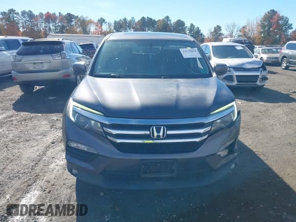 ✅ 2018 Honda Pilot EX-L • VIN: 5FNYF6H57JB028742 • Lot: 43575850. Listed on IAAI with 170,260 mi. Free auction sales archive from the USA and detailed vehicle history report at DreamBid. Image 12.