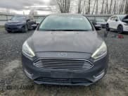 ✅ 2016 Ford Focus Titanium • VIN: 1FADP3J26GL325085 • Lot: 95766395. Wystawiony na Copart z przebiegiem 149 101 mil. Bezpłatny archiwum sprzedaży aukcyjnych z USA i szczegółowy raport historii pojazdu na DreamBid. Zdjęcie 5.