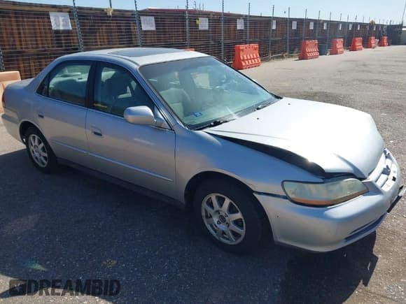 ✅ 2002 Honda Accord SE • VIN: 1HGCG56712A041830 • Lot: 42001605. Listed on IAAI with 201,451 mi. Free auction sales archive from the USA and detailed vehicle history report at DreamBid. Image 1.