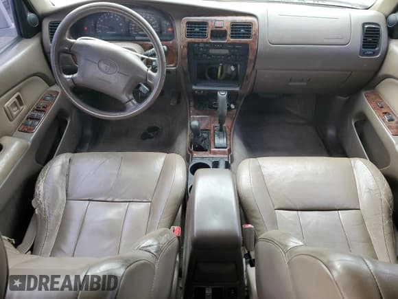 ✅ 1999 Toyota 4Runner Limited • VIN: JT3HN87R1X9024678 • Lot: 86105455. Listed on Copart with 289,001 mi. Free auction sales archive from the USA and detailed vehicle history report at DreamBid. Image 8.