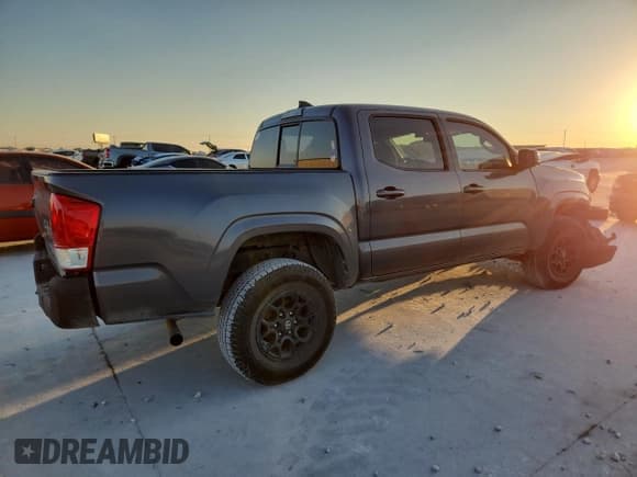 ✅ 2018 Toyota Tacoma SR • VIN: 5TFAX5GN2JX108658 • Lot: 87267255. Listed on Copart with 104,064 mi. Free auction sales archive from the USA and detailed vehicle history report at DreamBid. Image 3.