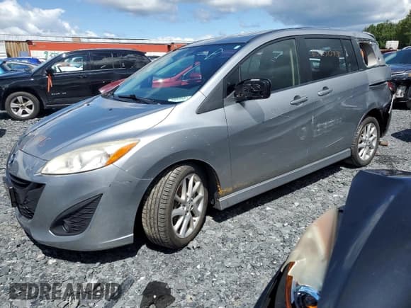 ✅ 2012 Mazda 5 Grand Touring • VIN: JM1CW2DL9C0135669 • Lot: 65231245. Listed on Copart with 215,165 mi. Free auction sales archive from the USA and detailed vehicle history report at DreamBid. Image 1.