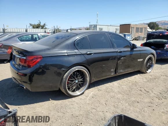 ✅ 2013 BMW 7 Series 750i • VIN: WBAYA8C59DD227527 • Lot: 64618025. Listed on Copart with 96,049 mi. Free auction sales archive from the USA and detailed vehicle history report at DreamBid. Image 3.
